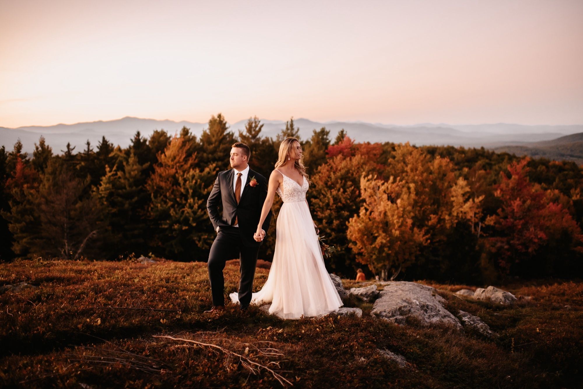 Mike and his wife on their wedding day on a New Hampshire mountaintop in fall